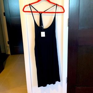 Black razor back dress. Never worn. Urban outfitters. Tags still on. Size M